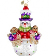 A snowman dusted with sugary sparkles and clutching two gingerbread men makes the One Sweet Trio ornament a very tempting addition to any tree. Handcrafted by Christopher Radko.
