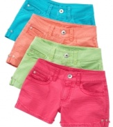 True colors. Add pizazz to her basic collection and she'll show off her bright side in a pair of these vivid Guess shorts.
