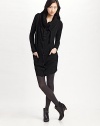 Rich, wool knit topper with a deep cowl collar to cinch closed with drawstrings.Convertible cowl collar Snap front Patch pockets Long sleeves Rib knit trim About 35½ from shoulder to hem Wool Dry clean Imported