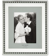 Sleek and modern with an unexpected touch, the Carling Way picture frame displays distinct kate spade style. A sculpted cane design typically found in furniture adds new dimension to lustrous silver plate.