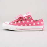 You'll have her seeing double in these cute polka dot sneakers. Features a double tongue and two sets of laces for ultra customization. Imported.
