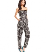 A boldly graphic print makes this RACHEL Rachel Roy jumpsuit a statement piece for a standout soiree look!