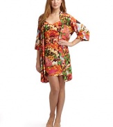 THE LOOKAllover abstract floral printWrap front with cinched drawstring tie closureElbow length sleevesTHE FITAbout 36 from shoulder to hemTHE MATERIALPolyester/spandexCARE & ORIGINMachine washImportedModel shown is 5'10 (177cm) wearing US size Small. 