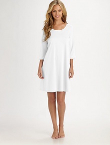 Luxurious versatility in a classic silhouette created from long-staple Egyptian Giza cotton, mercerized for ultra softness and a natural sheen.Scoop necklineThree-quarter sleevesUnderstated, shaped styleMercerized Egyptian Giza cotton interlockMachine washImportedAdditional Information Women's Modern Size Guide 