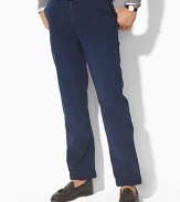 Classic-fitting pants tailored in fine woven cotton, designed with a flat front, narrow leg and washed for a vintage, timeworn appeal. Standard-rise belted waist. Angled hand pockets, split-besom pockets at back. Embroidered pony accents the back right pocket. Zip fly with button closure.