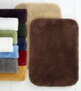 Classic comfort. Plush, Comforel nylon provides a sweet retreat for your feet in this sumptuously soft Charter Club bath rug. Choose from a lush array of bleach-and-stain resistant hues.