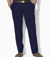 Tailored from a mid-weight timeworn chino, these timeless pants are designed with double forward pleats and a narrow leg. Standard-rise belted waist. Side on-seam pockets, split-besom pockets at back. Embroidered pony accents the back right pocket. Zip fly with button closure.