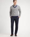 The downy luxury that can only come from pure cashmere, shaped with a contrast V-neck that sharpens every look. V-neck Cashmere Hand wash Imported 