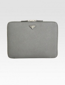 This sleek, compact case of signature etched leather is crafted with inner padding to keep your iPad® secure.Accommodates all iPad® models Zip-around closure Enamel triangle logo Polished steel hardware One inside open pocket Nappa leather lining 10¼ x 8H x ¾D Made in Italy