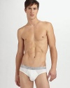A seamless, body-conscious fit that won't show under clothes, featuring a low rise, contoured pouch and metallic elastic logo waist. 96% modal nylon/4% spandex Machine wash Imported 
