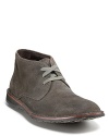 With tonal laces a low, lean profile, this soft suede chukka keeps your look cool and quietly sophisticated.