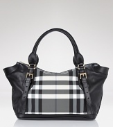 A bold black and white check panel lends statement style to this go-anywhere tote from Burberry.