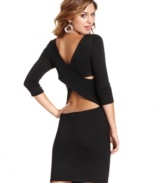 Designed with an alluring, crisscross back design, this little black dress from Sugar & Spice captivates with its sophisticated style.