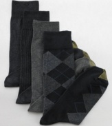 Classic argyle puts a sophisticated spin on your 9-to-5 routine with this convenient 4-pack of dress socks from Gold Toe.
