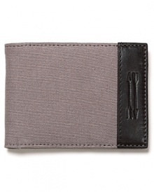 A quality wallet from Ben Minkoff trimmed with fine leather and a handsome double arrow logo features five card slots to support all your essentials in style. A quality wallet from Ben Minkoff trimmed with fine leather and a handsome double arrow logo features five card slots to support all your essentials in style.