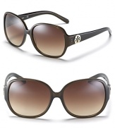 Chic oversized glasses with signature logo embellishment at temples from Tory Burch.