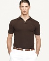 Cut in a trim, contemporary silhouette, a short-sleeved polo shirt embodies sleek, iconic style in breathable stretch cotton piqué that's mercerized for a handsome luster.