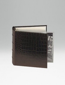 Crafted of crocodile-embossed Italian calfskin, this handsome design is the perfect way to store and display treasured photos. 18 clear pocket leaves hold 36, 4 X 6 photos 5½ X 6¾ Made in USA Crafted of crocodile-embossed Italian calfskin, this handsome design is the perfect way to store and display treasured photos. 18 clear pocket leaves hold 36, 4 X 6 photos 5½ X 6¾ Made in USA