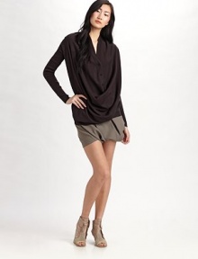 Soft pleats swing to the side in these ingeniously tailored shorts of superfine wool.Set-on waistband with belt loops Side zipper Rise, about 18½ Wool; dry clean Imported Soft pleats swing to the side in these ingeniously tailored shorts of superfine wool.Set-on waistband with belt loops Side zipper Rise, about 18½ Wool; dry clean Imported