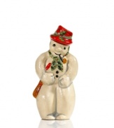 Shaped with a vintage chocolate mold for sweet, one-of-a-kind style, this charming Vaillancourt snowman figurine is hand painted in a dapper red hat and green scarf for extra-festive flair.
