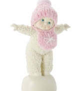 Standing atop a snow mound, this adorable baby girl is about ready to spin. Crafted of porcelain bisque, this Snowbabies figurine makes an adorable gift for any new parent.