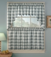 Get your country home in check with Rowan Plaid tiered swag valances. A classic pattern in soothing slate or gold tailors the room with effortless charm. Dyed yarns filter light to keep out the summer sun.