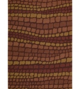 At once rustic and chic, Nourison's Brick Fantasy rug is a stepping stone to great contemporary style in any home. Hand-hooked of high-density fibers, the rug features a cobblestone-inspired pattern in tonal brick shades, lending an earthy, elemental feel to any space.