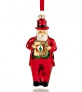 There is a Santa Claus! Reminiscent of the Yes, Virginia tale, this festive ornament depicts the season's jolliest fellow in brilliant glass.