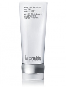 This moisturizing self-tanner tans your skin slowly and subtly resulting in an even, natural, sun kissed tan. Formulated with a delicate fresh scent and lightweight, non-greasy touch, Gradual Self Tanning Lotion is ideal for those who wish to maintain a healthy, golden glow every day of the year. 6 oz. This moisturizing self-tanner tans your skin slowly and subtly resulting in an even, natural, sun kissed tan. Formulated with a delicate fresh scent and lightweight, non-greasy touch, Gradual Self Tanning Lotion is ideal for those who wish to maintain a healthy, golden glow every day of the year. 6 oz.