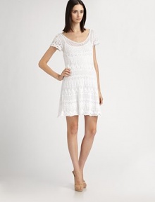 Delicately crocheted cotton lace, in a sweet, easy-too-wear A-line silhouette.ScoopneckCap sleevesAllover cotton laceAbout 21½ from natural waistCottonDry cleanMade in Italy of imported fabric