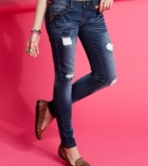 Detailed in rips and studs, these five-pocket skinny jeans from Dollhouse infuse your look with pretty gritty style.