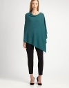 Crafted from Italian wool, this poncho will fashionably complete virtually any look. Try wearing it as a tunic over straight-leg pants. Pull-on styleAsymmetrical hemAbout 25 from shoulder to hemWoolDry cleanImported of Italian fabric
