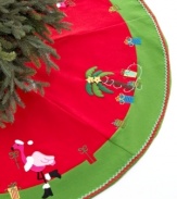 Head south for the winter with a tree skirt trimmed in palms and pink flamingos. Embroidered accents and ribbons of red and green lay the groundwork for a bright and sunny holiday.