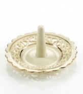 Distinguished by a scalloped edge, bands of gold and heart cutouts in creamy ivory porcelain, this lovely ring holder combines traditional style and timeless grace. Qualifies for Rebate