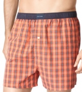 Pick this pair for its Halloween theme . . . or as another witty plaid to add to your collection. Orange-and-black boxer shorts from Tommy Hilfiger styled with a button fly and contrast elastic waist.