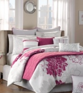 The Lola decorator set features dahlia graphics in hot pink and grey. Thin hot pink piping and alternating striped accents complete this sleek, urban look with a beautiful edge. In addition, the diamond quilted design across the coverlet and decorative pillow offer relaxing details and complementary texture.