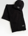 Give the gift warmth for the holidays with this handsomely knit hat and scarf set that's sure to keep you nice and toasty.12W x 69HAcrylicDry cleanImported