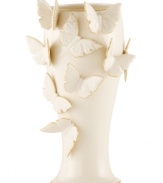 The essence of whimsy, this Lenox Flutter vase will lift your spirits with gold-tipped butterflies and elegant banding in timeless ivory porcelain.