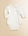An essential one-piece bodysuit is extra special with scalloped trim, stitching and ruffled Peter Pan collar.Ruffled and stitched Peter Pan collarLong sleeves with scalloped cuffsBack snapsBottom snapsCottonMachine washImported Please note: Number of snaps may vary depending on size ordered. 