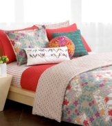A mixed bouquet of color and pattern makes the Trellis comforter set an irresistible pick-me-up for tired decor. Bright stenciled blooms reverse to a geometric print and come together in one delightfully fresh ensemble. (Clearance)