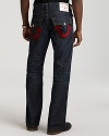 Red stitching is a fierce touch on on these True Religion jeans with straight legs in a deep, dark wash.