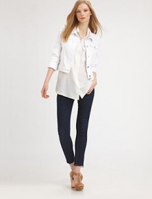 The classic denim topper, closely cropped in a slim-fitting silhouette.Point collarButton-down frontFront chest pocketsAbout 20 from shoulder to hem94% cotton/5% polyester/1% Lycra Made in USAModel shown is 5'10 (178cm) wearing US size Small.