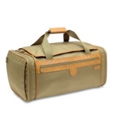 Going, going... gone in style. Your one step ahead of your trip with this versatile and classic bag that has a place for all of your travel must-haves. Exterior side gusset pockets and a front last-minute stowaway zip pocket put tickets, IDs and in-flight entertainment at an arm's reach. A convenient built-in show bag and organizer panel put life on display and in order. Lifetime warranty. Qualifies for Rebate