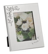 Picture perfect. An embossed motif graces the Vera Lace Bouquet picture frame, embodying the timeless beauty of Vera Wang in lustrous silver plate. A versatile choice for landscape or portrait photos.