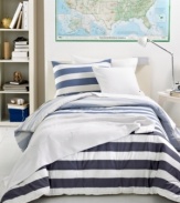 Give your bed a modern makeover with this Concordia Ice comforter set, featuring broad stripes in pale to dark blue hues and alternating white layers. Polished & preppy. It's classic Lacoste.