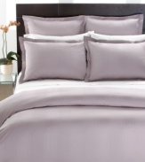 Lustrous tonal jacquard stripes bring tailored sophistication to indulgently soft 700 thread count MicroCotton® in this luxurious Hotel Collection sham.