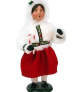 Flushed from the cold but filled with warmth, this young caroler is ready for the North Pole's biggest event of the year in a fluffy snow-white coat. A beauty from Byers' Choice.