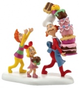 The Whoville baker has a following – Cindy Lou-Who and another Who trail close behind as he delivers colorful cakes and pie to the banquet hall, part of Grinch Village. By Department 56.