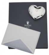 A lovely stationary set for the doting pen pal, Ballet Ribbon notecards embossed with dreamy heart-shaped strokes match silver-lined envelopes and a silver-plated paperweight. All in an elegant gift box.