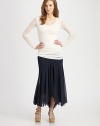 Softly pleated and all-around flattering, a classic maxi skirt with an edgy asymmetrical hem.Elasticized waistAbout 32 longPolyamideDry cleanMade in Italy Model shown is 5'9 (175cm) wearing US size Small. 